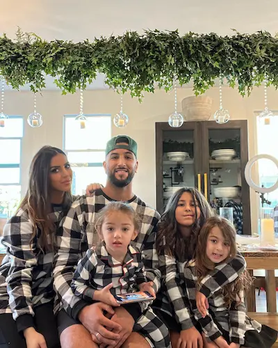 Nader Furrha together with his wife and kids